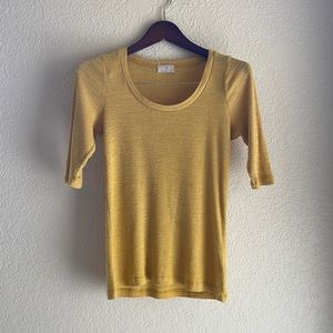 t.la, size medium yellow quarter length sleeve shirt